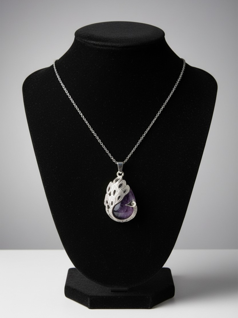 Silver Peacock Pendant Necklace with Purple Teardrop Gem